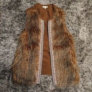 Faux fur vest with patterned trim